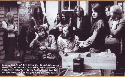 The band In the backyard of 5 St Radigunds Street along with manager and sound engineer.