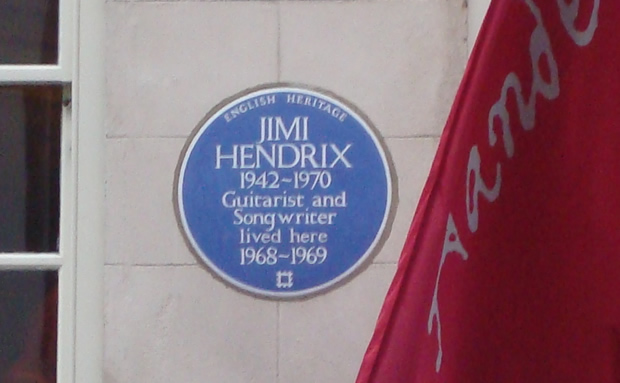 Plaque reads "English Heritage - Jimi Hendrix 1942-1970 Guitarist and song writer lived here 1968-1969"